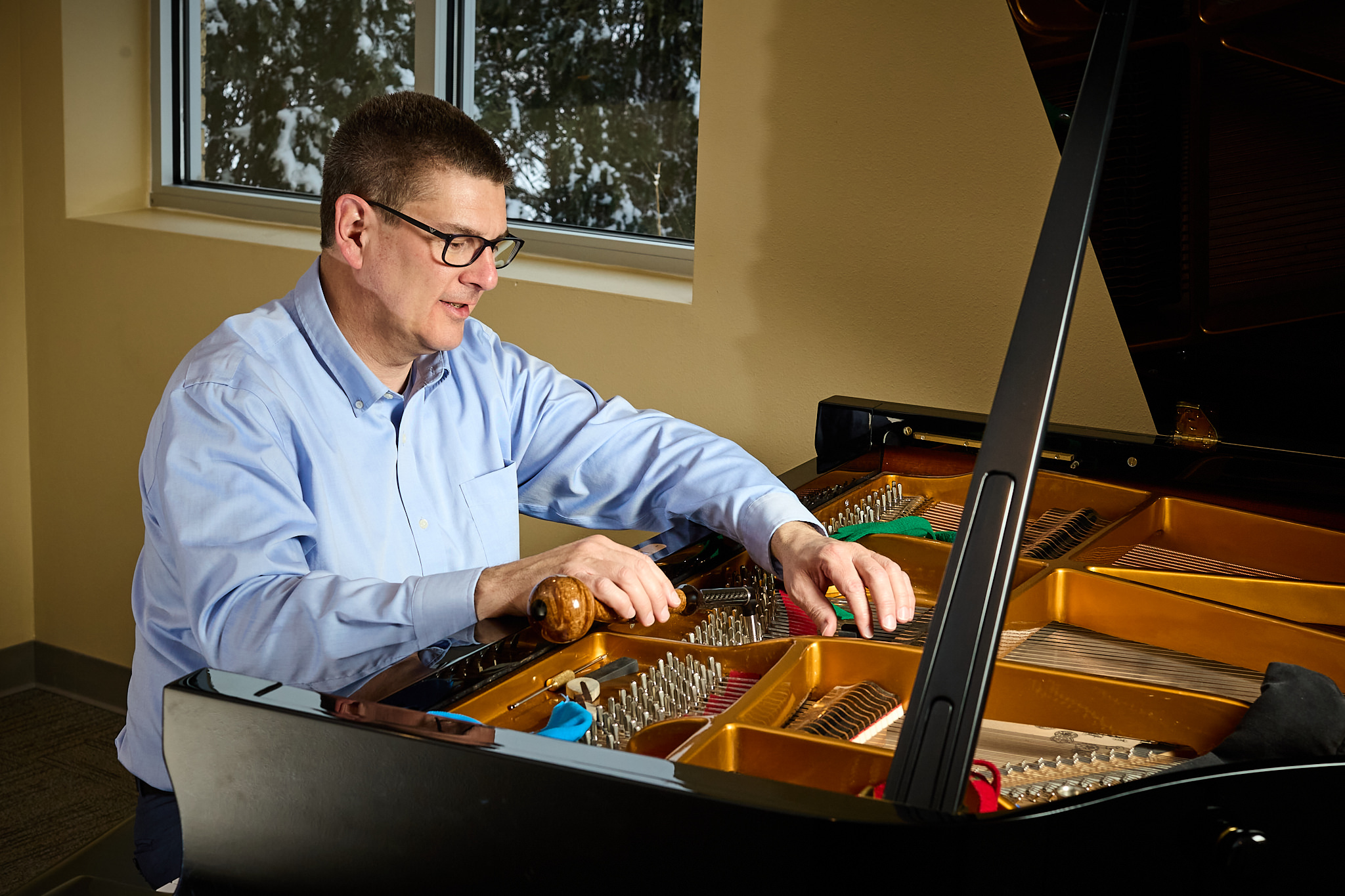 Dave Hulbert tuning a grand piano